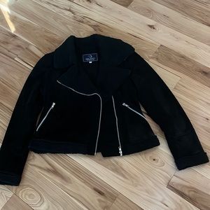 Black zippered short jacket. Suede feel and warm interior. In good shape.